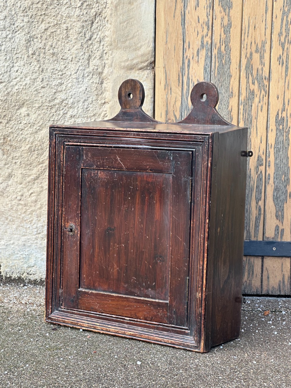 An interesting elm and pine Mural cabinet, British, circa late 17th /early 18th century