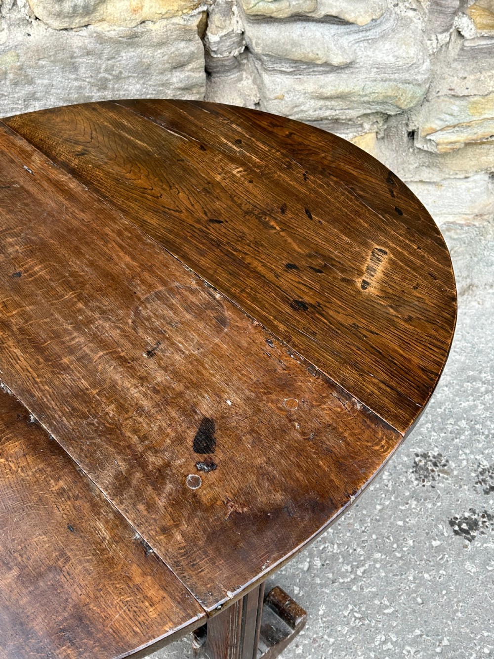 An oak joined Tavern  table c.1650-1680, with repairs and replacements View X