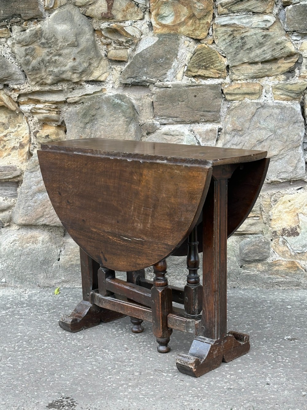 An oak joined Tavern  table c.1650-1680, with repairs and replacements View XI