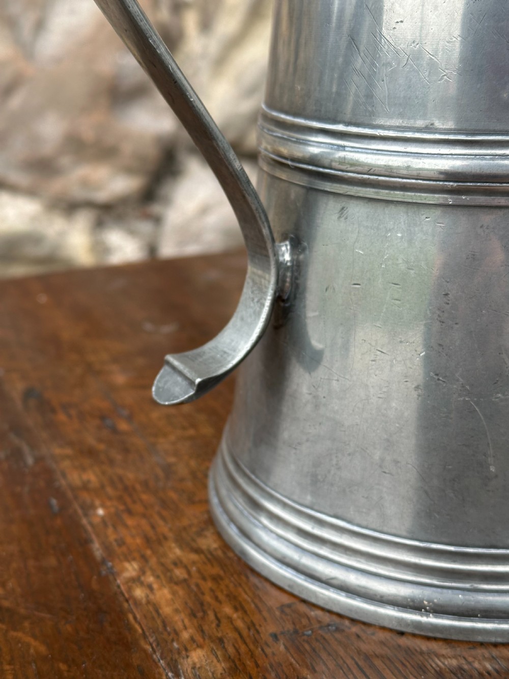 A pair of Scottish George III pewter flat-lidded flagons, c.1800 View II