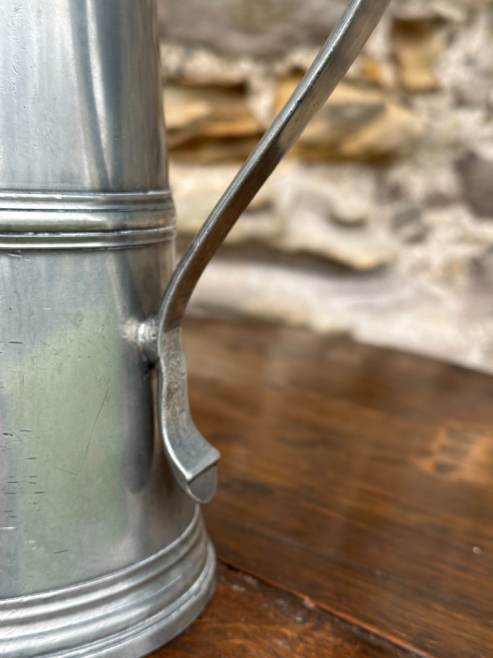 A pair of Scottish George III pewter flat-lidded flagons, c.1800 View III
