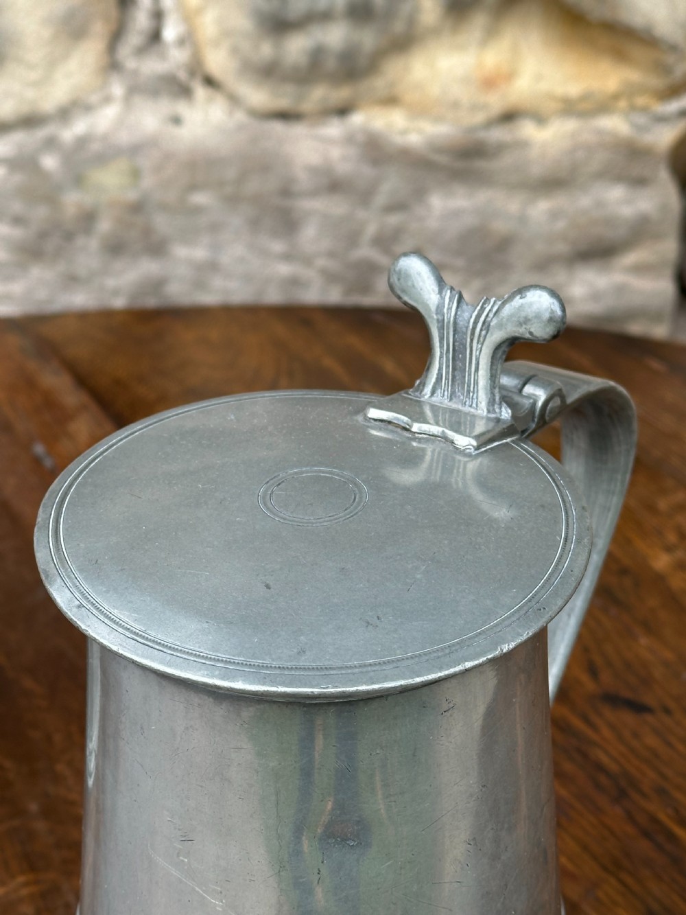 A pair of Scottish George III pewter flat-lidded flagons, c.1800 View V