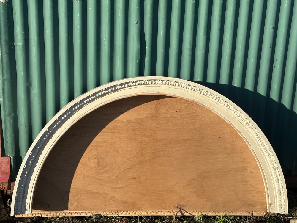 A Georgian carved wooden internal door archway