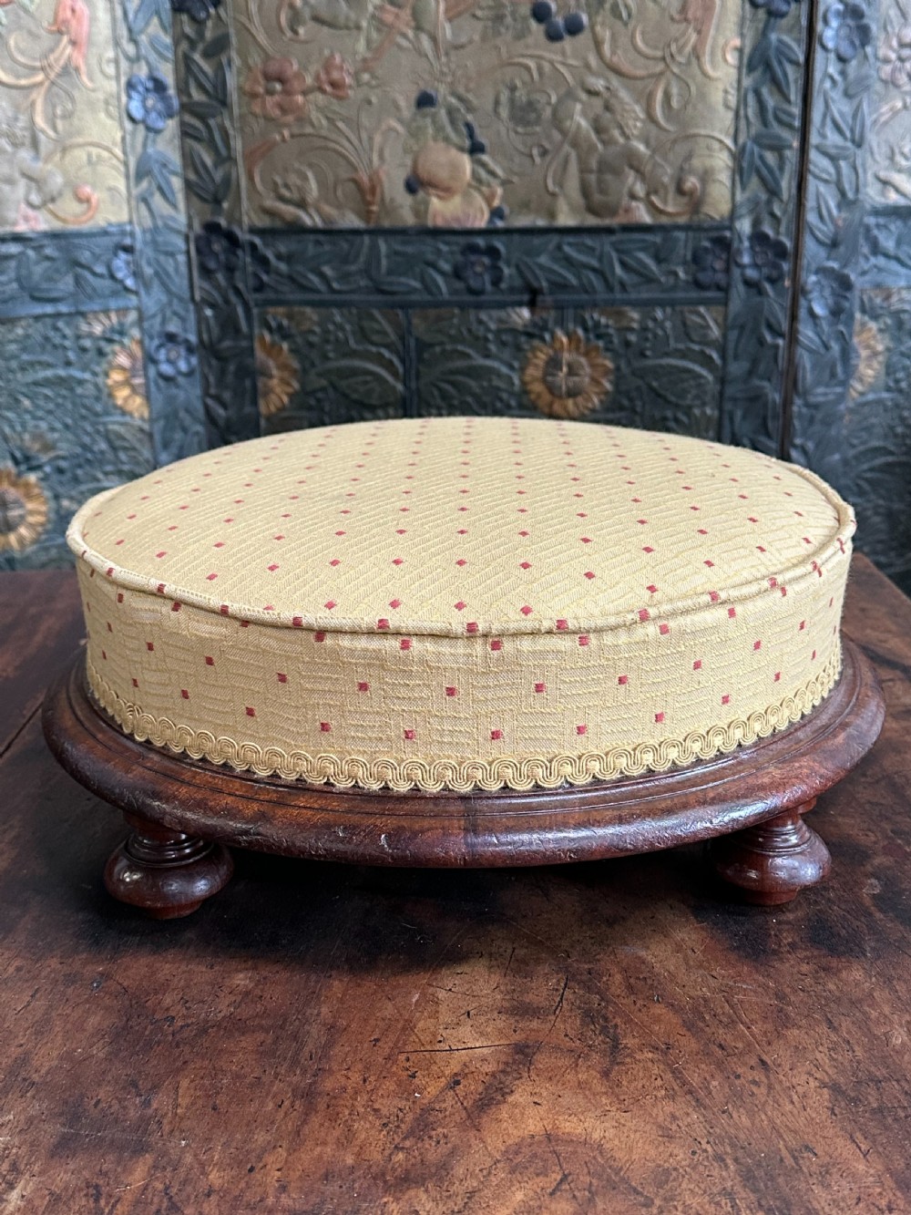 A Gillows of Lancaster mahogany 'cake stand' footstool