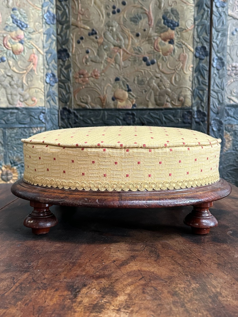 A Gillows of Lancaster mahogany 'cake stand' footstool View II