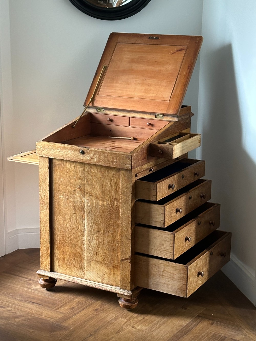 An oak Davenport desk attributed to Gillows.c.1830