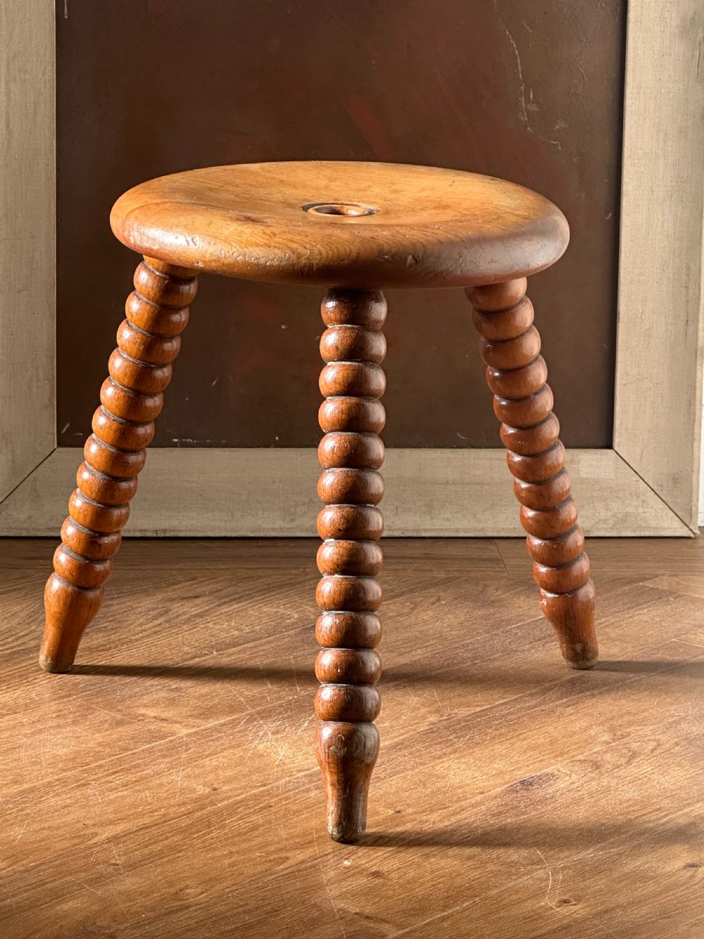 A Scottish 19th century solid birch stool. View II