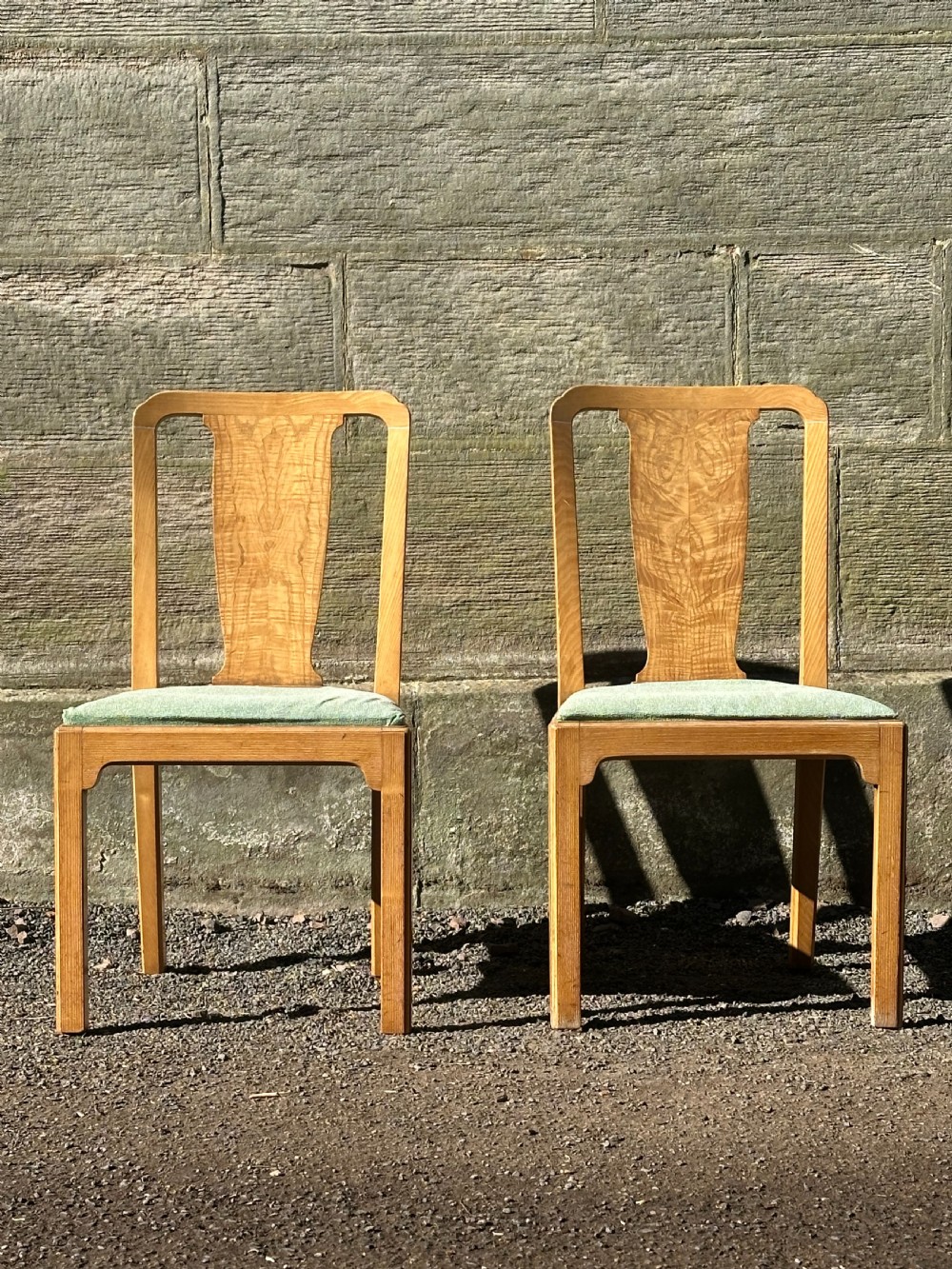 An pair of ash side chairs by Whytock & Reid in the style of Sir Robert Lorimer, Edinburgh 1920's