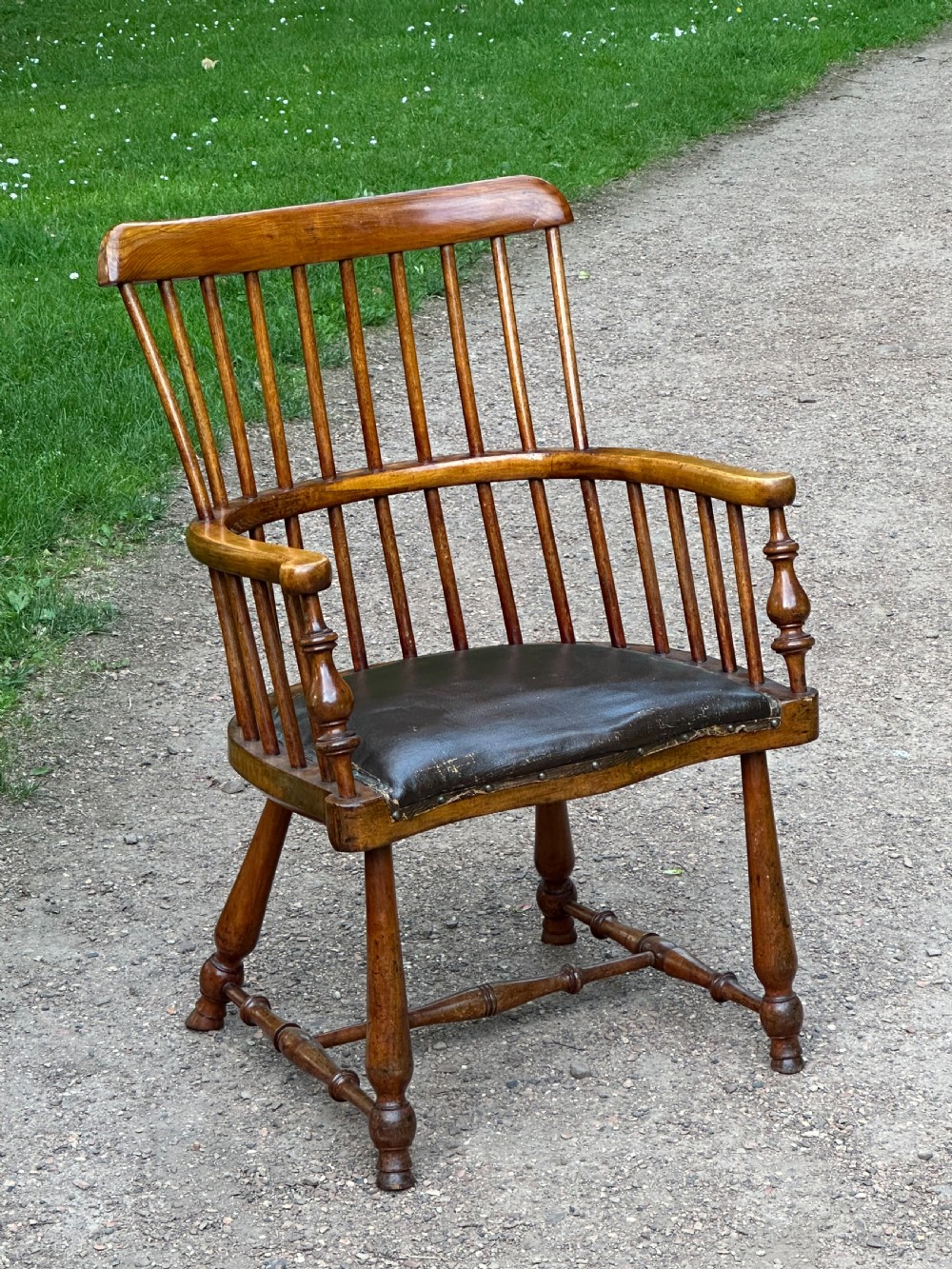 An unusual low-backed Darvel chair attributed to Hugh Shields, Ayrshire, late 19th century