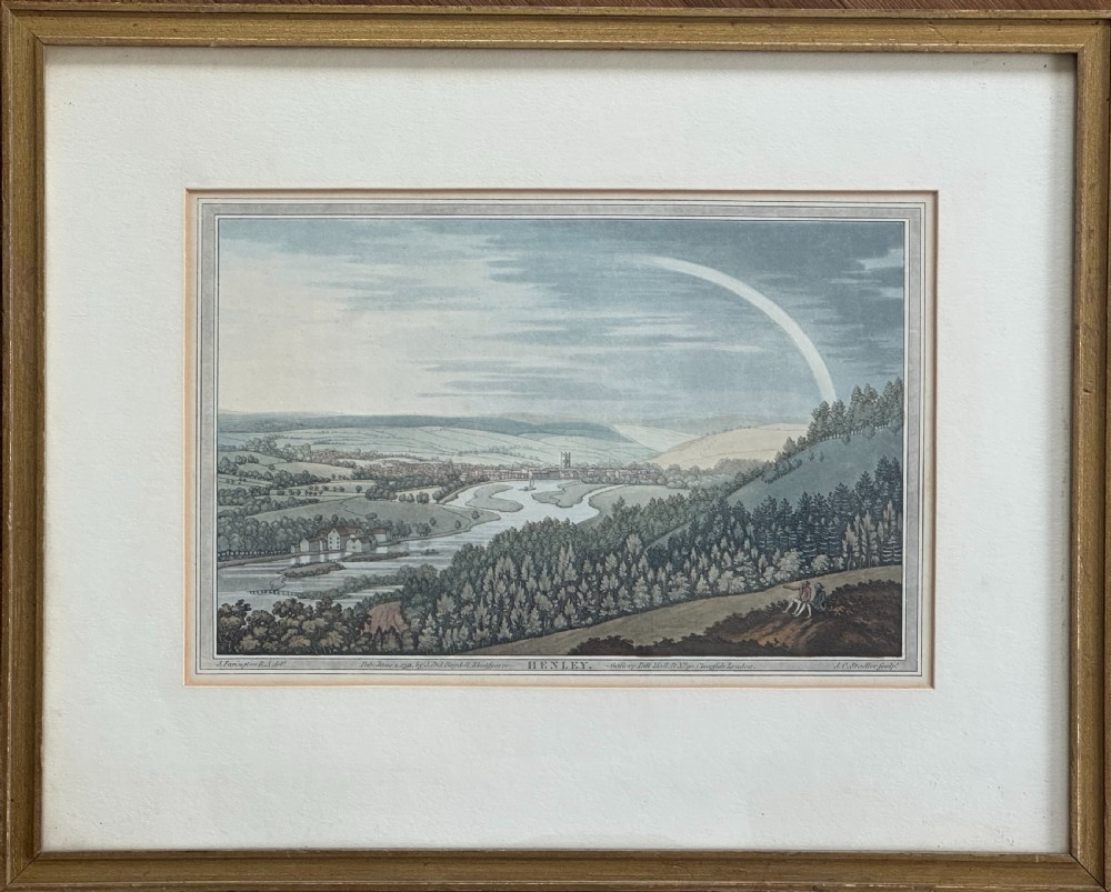 An eighteenth-century hand-coloured aquatint print illustrating a river landscape view of Henley with a faint rainbow across a cloudy sky. View V