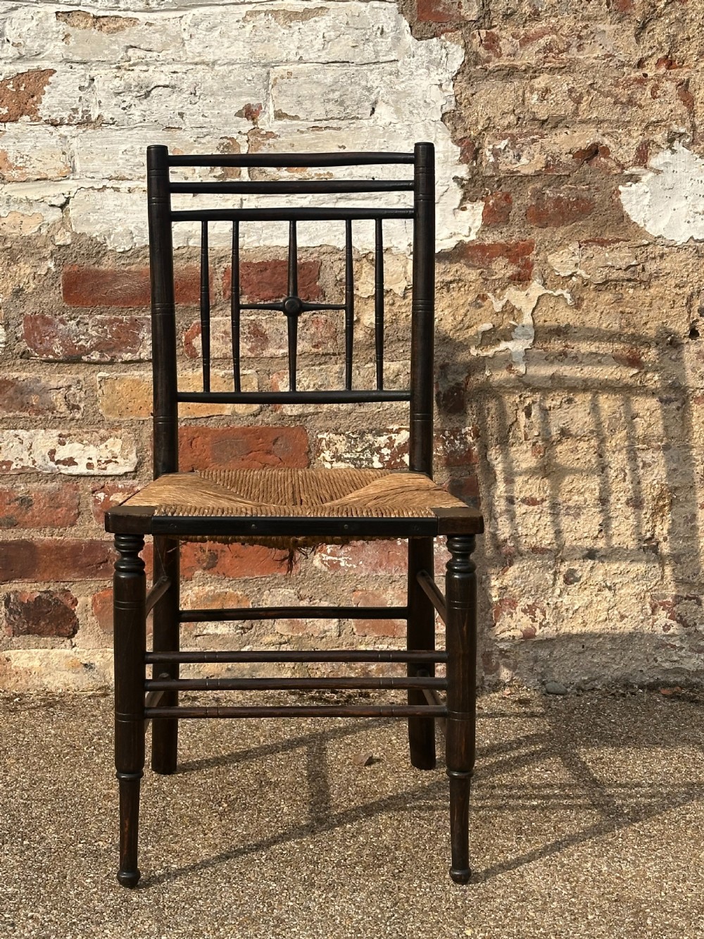 Two Ford Maddox Brown type Sussex chairs by Morris & Co. View IV