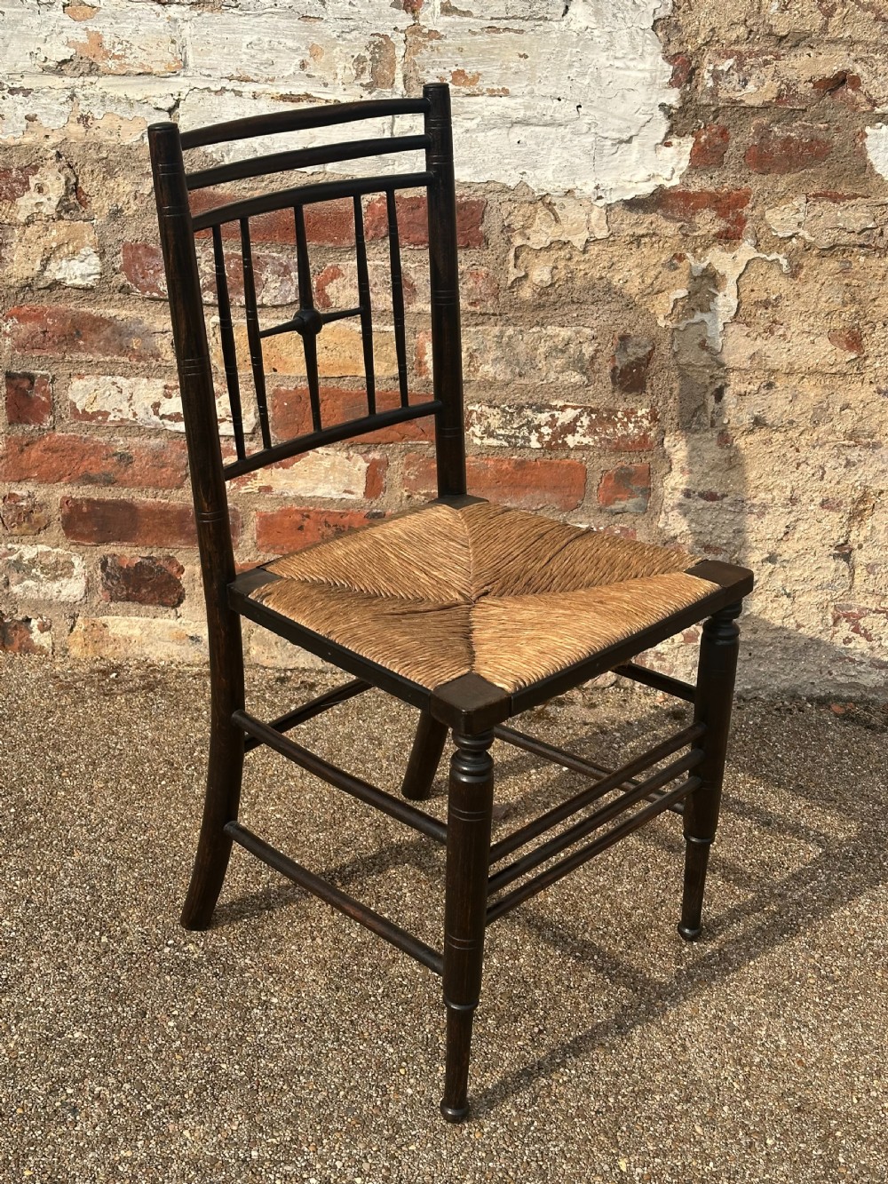 Two Ford Maddox Brown type Sussex chairs by Morris & Co. View V
