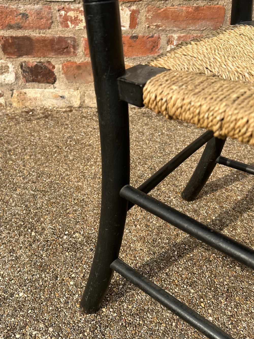 Two Ford Maddox Brown type Sussex chairs by Morris & Co. View VII