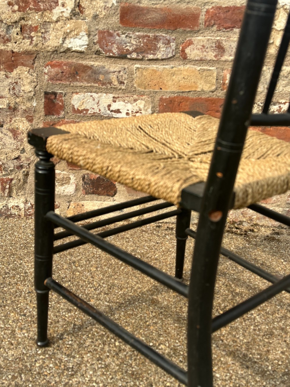 Two Ford Maddox Brown type Sussex chairs by Morris & Co. View VIII
