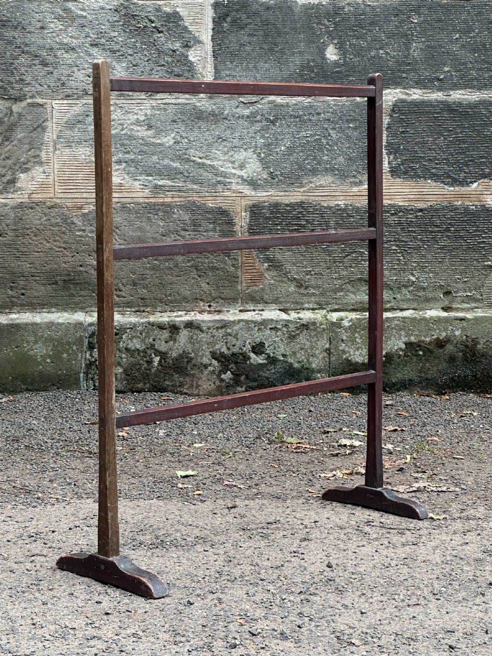 A Scottish George III stained pine towel rail