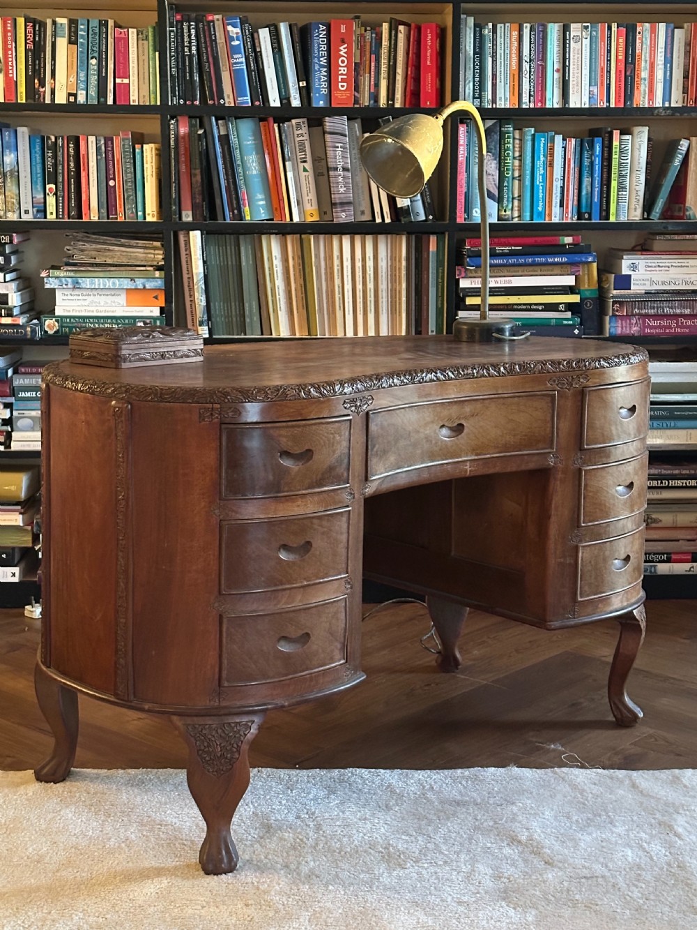 An Anglo Indian solid walnut kidney-shaped desk, possibly Kashmir. 1920's View II