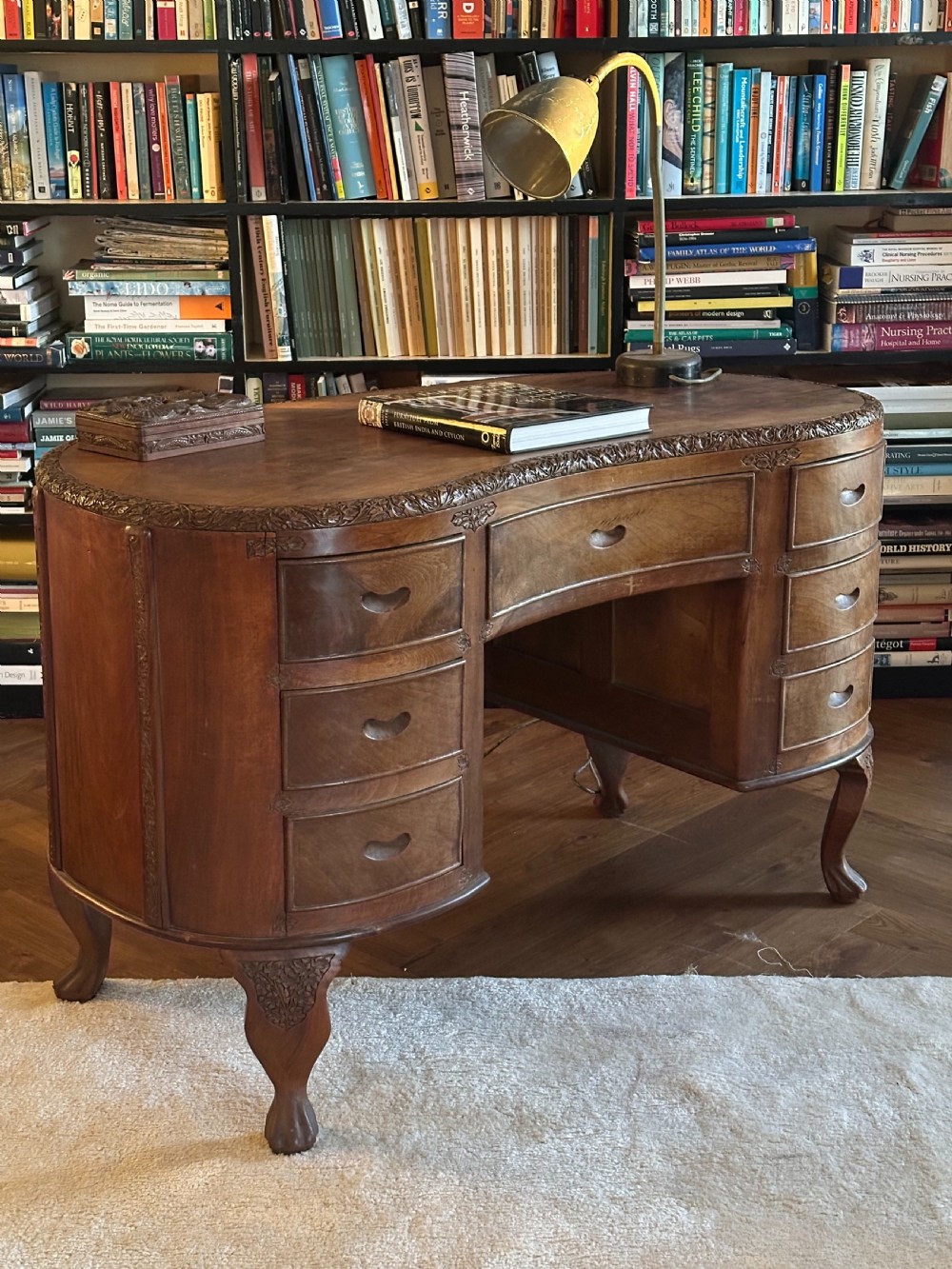 An Anglo Indian solid walnut kidney-shaped desk, possibly Kashmir. 1920's View XV