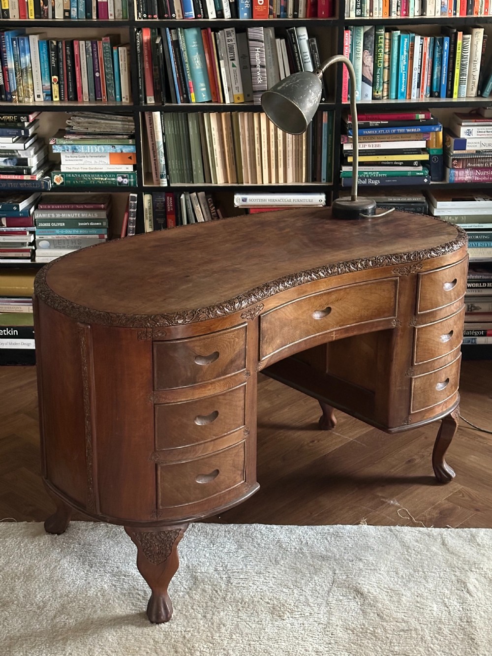 An Anglo Indian solid walnut kidney-shaped desk, possibly Kashmir. 1920's