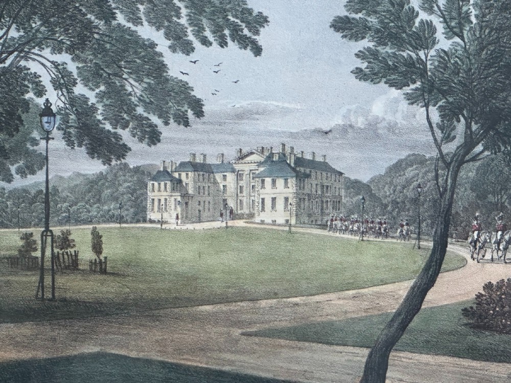 A 19th-century framed coloured lithograph depicting Dalkeith House in a landscape setting, set within a dark green mount and a gold gilt frame. View II