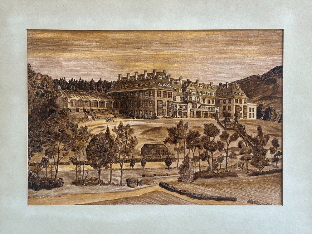 A sepia-toned wooden marquetry panel illustrating the architectural facade of Peebles Hydro surrounded by trees and grounds. View II