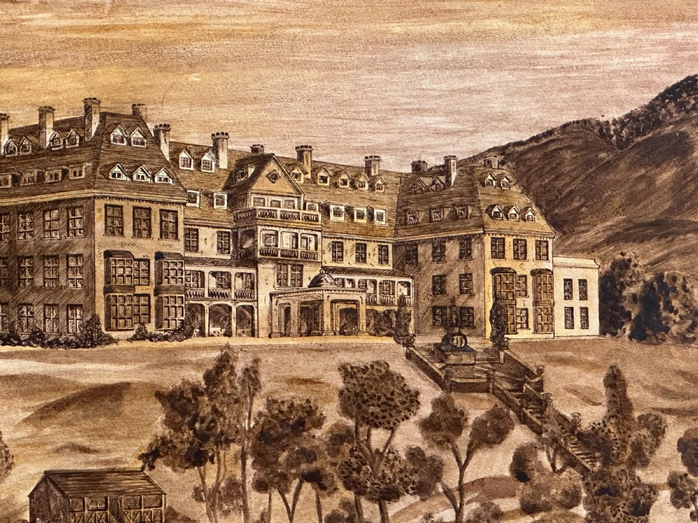 A sepia-toned wooden marquetry panel illustrating the architectural facade of Peebles Hydro surrounded by trees and grounds. View IV