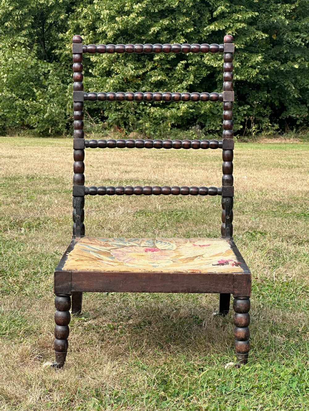 A 19th century ebonised bobbin chair, probably Scottish View III