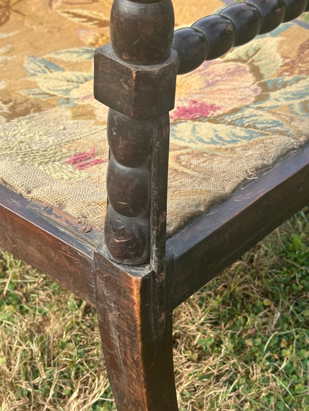 A 19th century ebonised bobbin chair, probably Scottish View IX