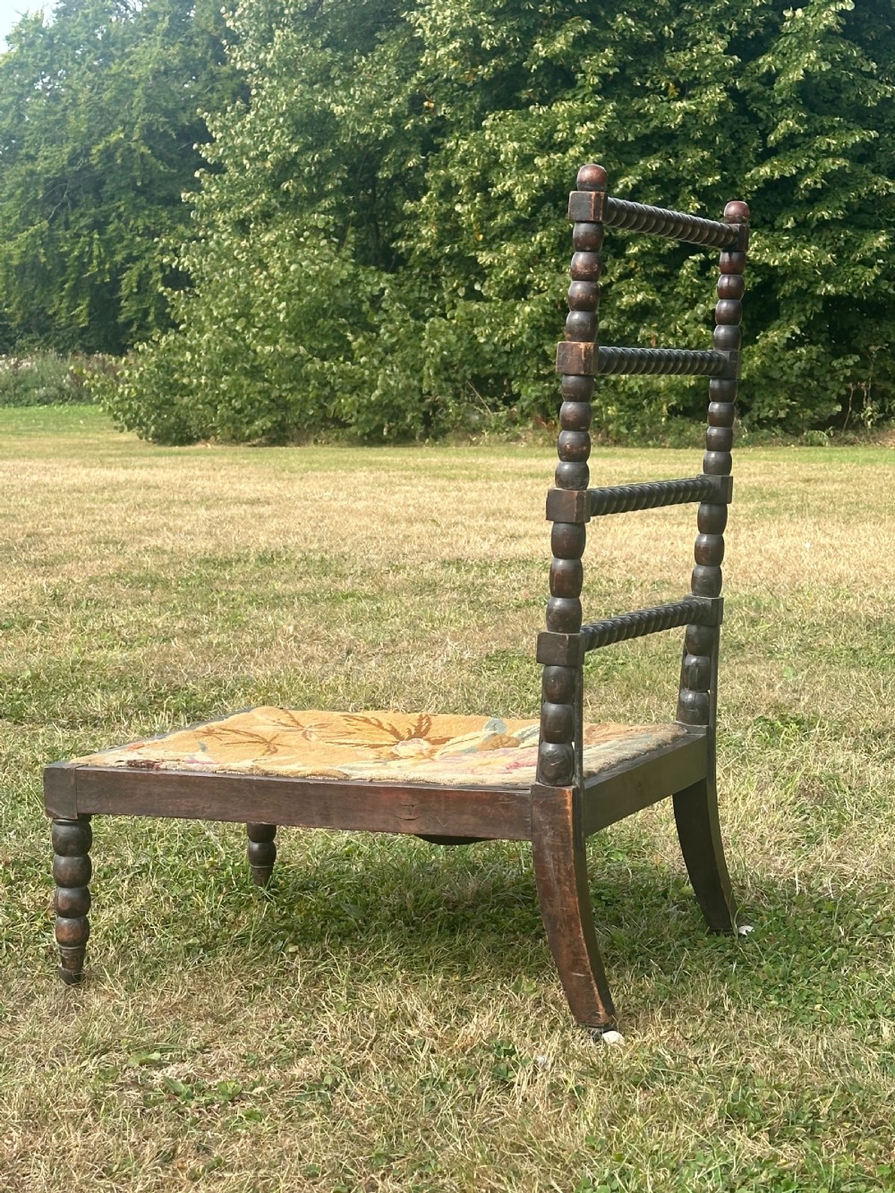 A 19th century ebonised bobbin chair, probably Scottish View X