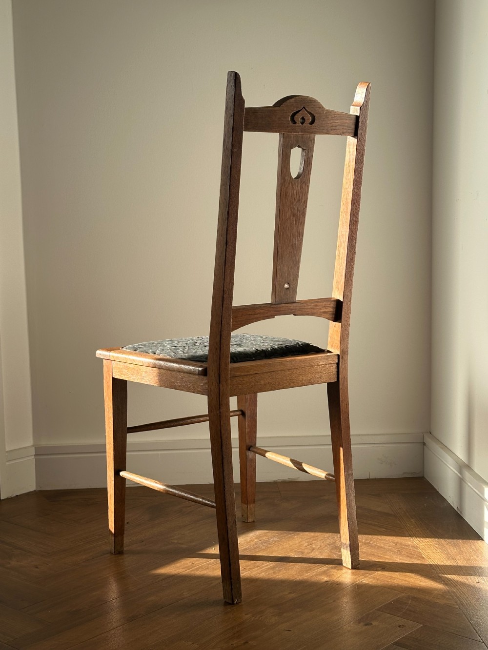 E. A Taylor (Scottish 1871-1951) A Glasgow School carved oak side chair View V