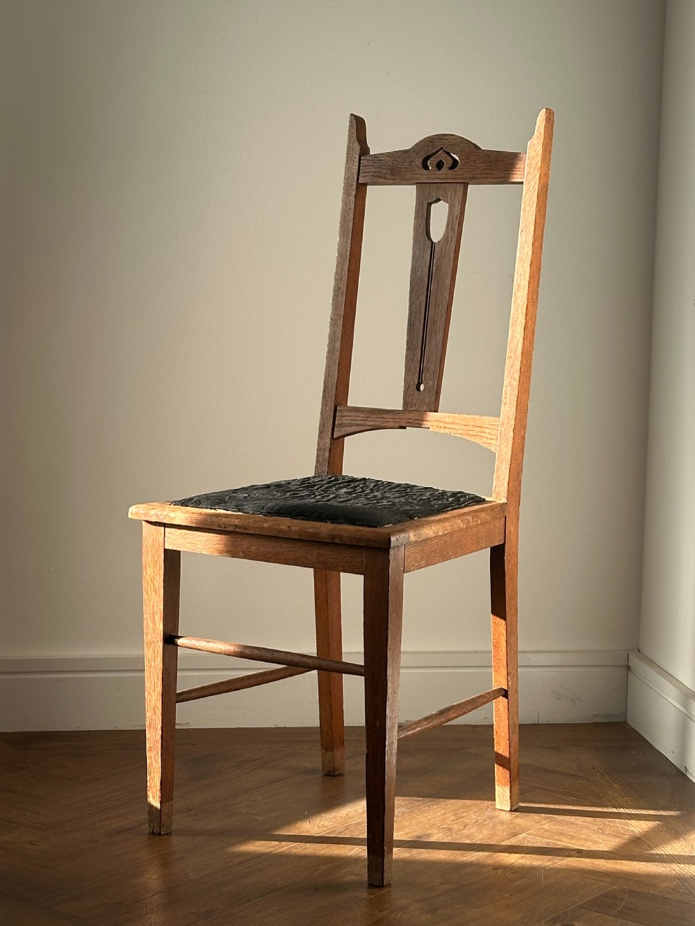 E. A Taylor (Scottish 1871-1951) A Glasgow School carved oak side chair View VI