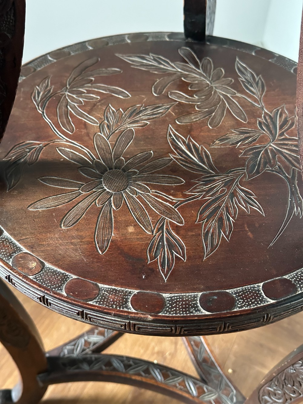 A Japanese Export carved two tier vase stand, Meiji Era View II