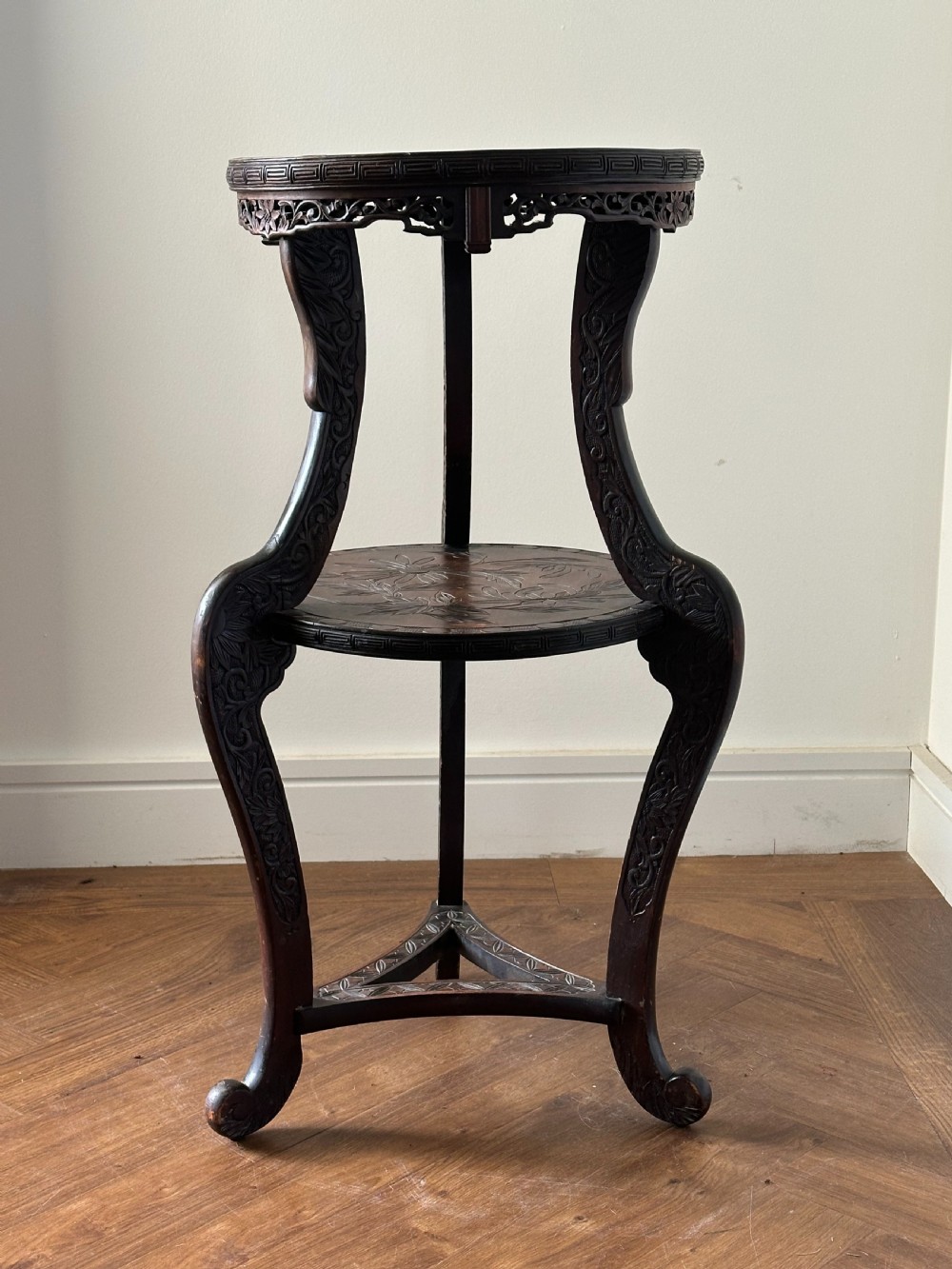A Japanese Export carved two tier vase stand, Meiji Era View III