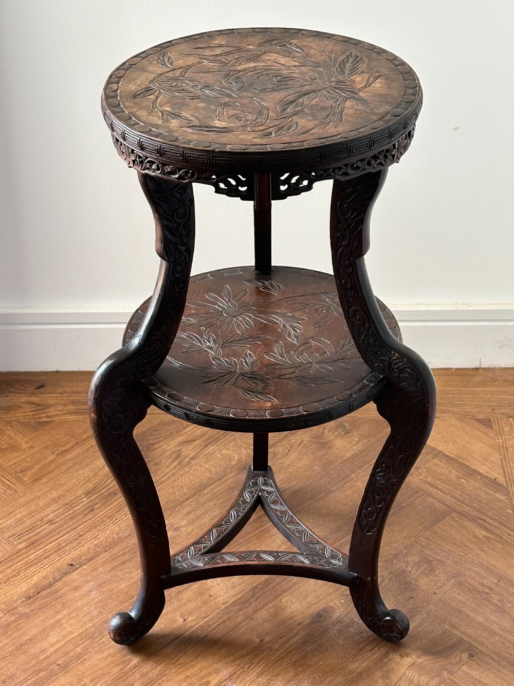 A Japanese Export carved two tier vase stand, Meiji Era