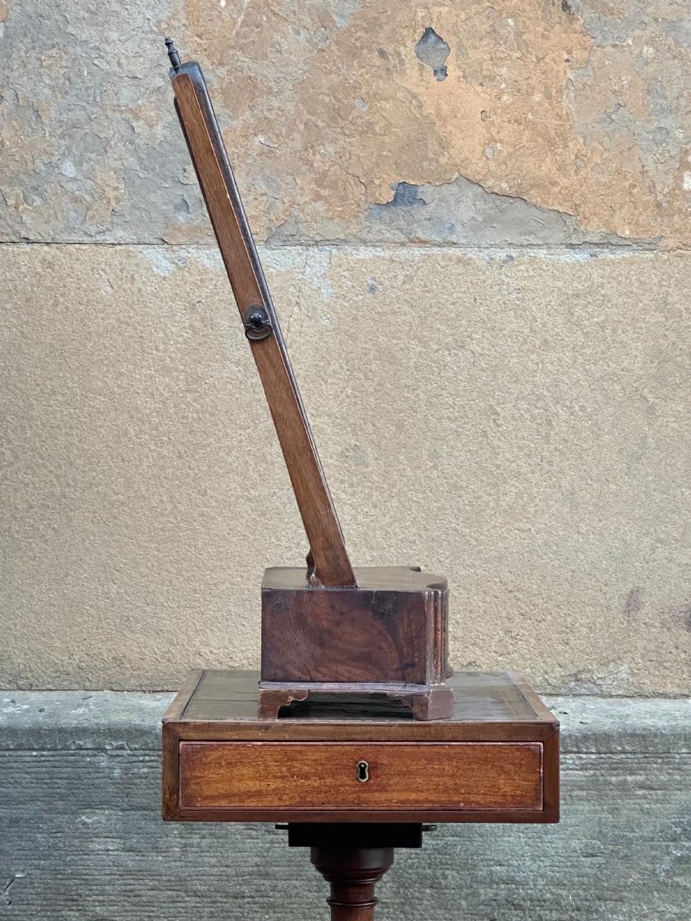 A mid-18th-century George II mahogany toilet mirror with a rectangular swing glass supported by side uprights above a drawers base. View III