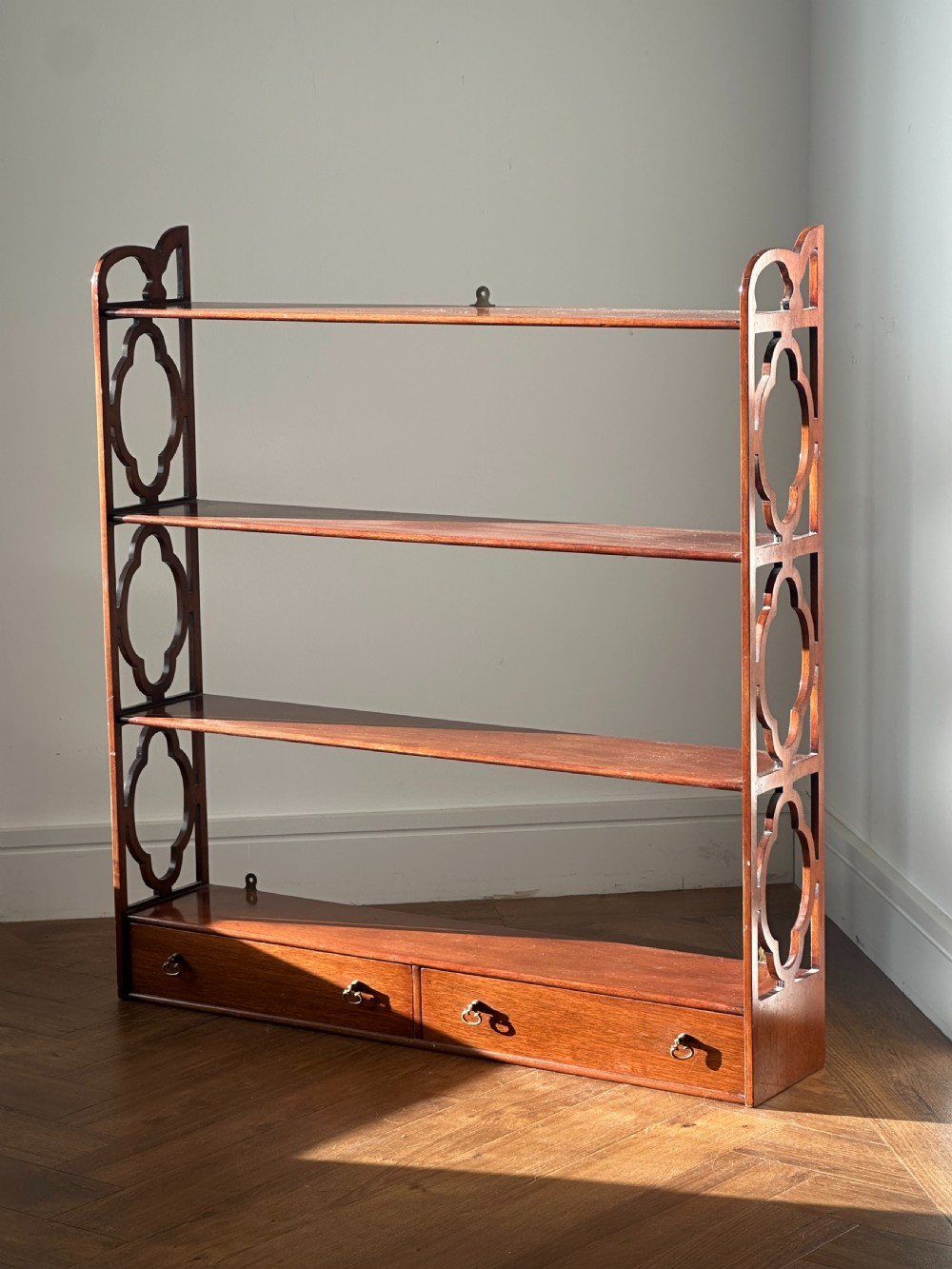 A nice quality set of George III style mahogany hanging shelves