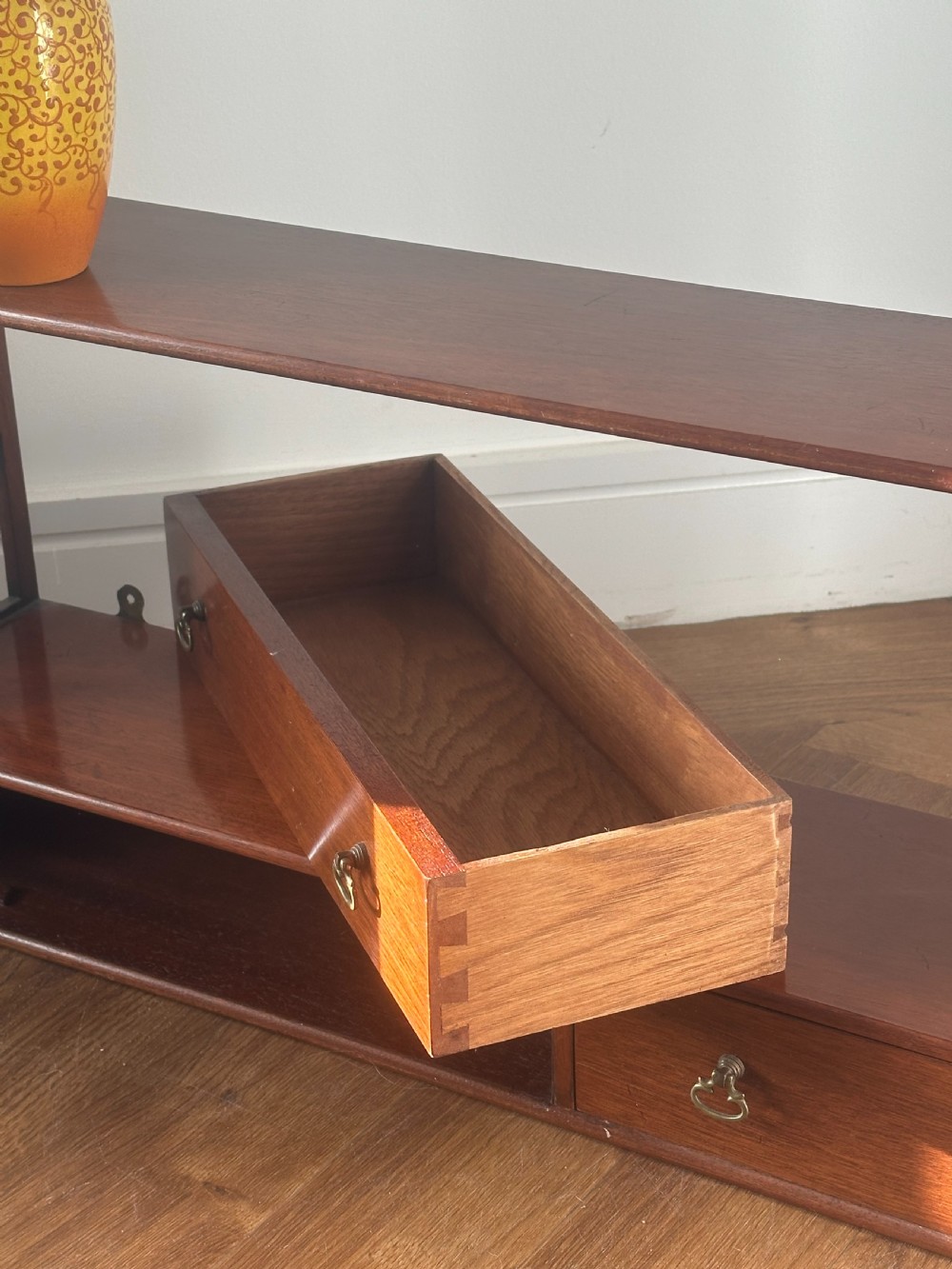 A nice quality set of George III style mahogany hanging shelves View III
