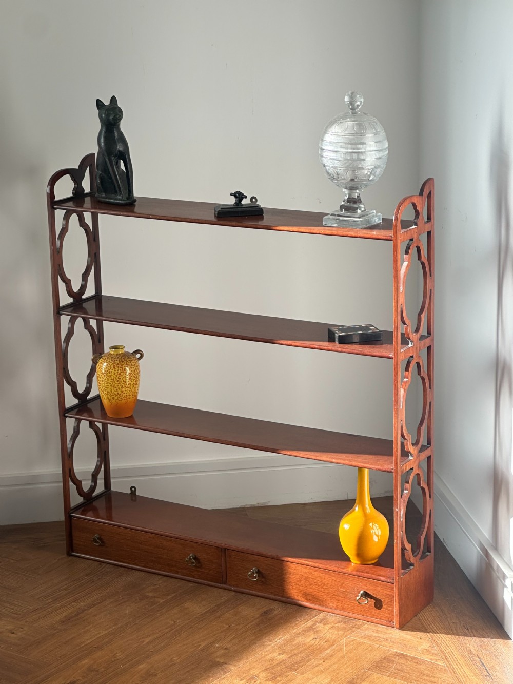 A nice quality set of George III style mahogany hanging shelves View V