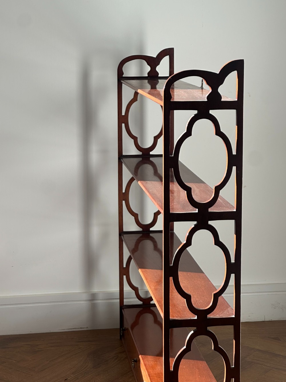A nice quality set of George III style mahogany hanging shelves View VII