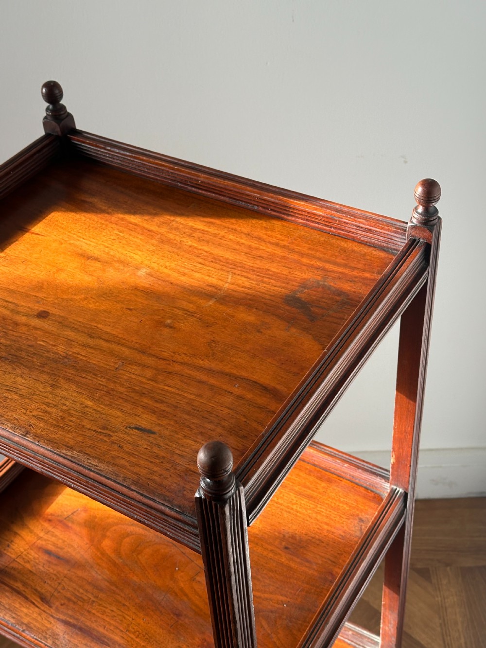 A walnut Aesthetic Movement three tier whatnot in the manner of E.W Godwin View II