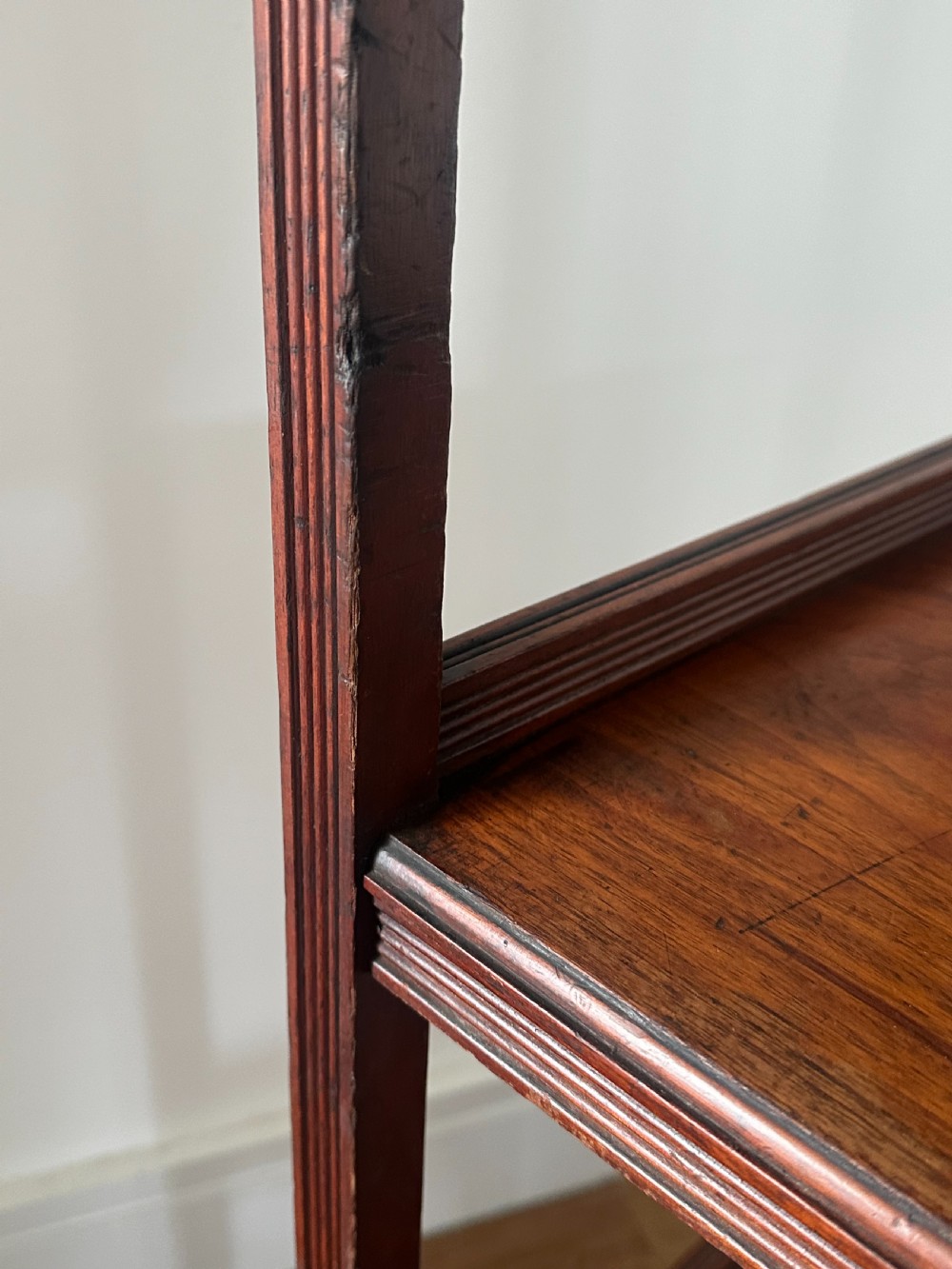 A walnut Aesthetic Movement three tier whatnot in the manner of E.W Godwin View VIII