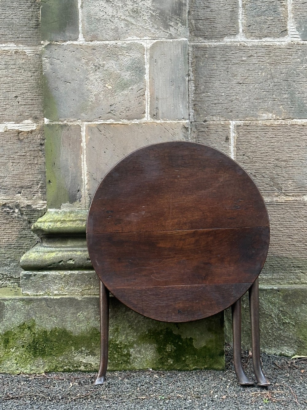 A George II oak coaching table, second quarter 18th century