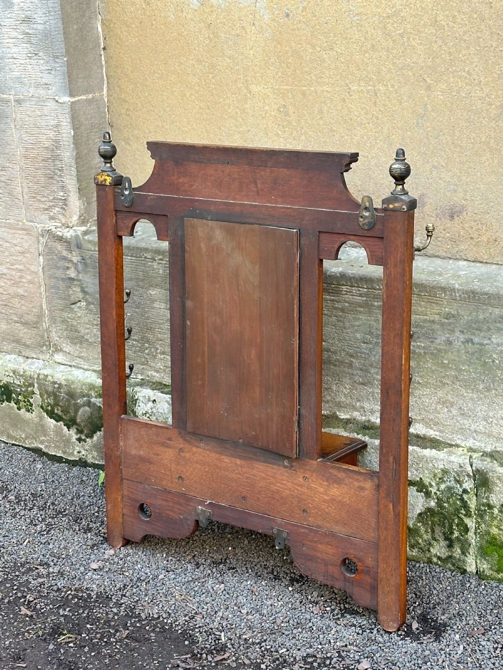 Attributed to James Shoolbred, an Aesthetic Movement oak and brass-mounted hall rack View VII