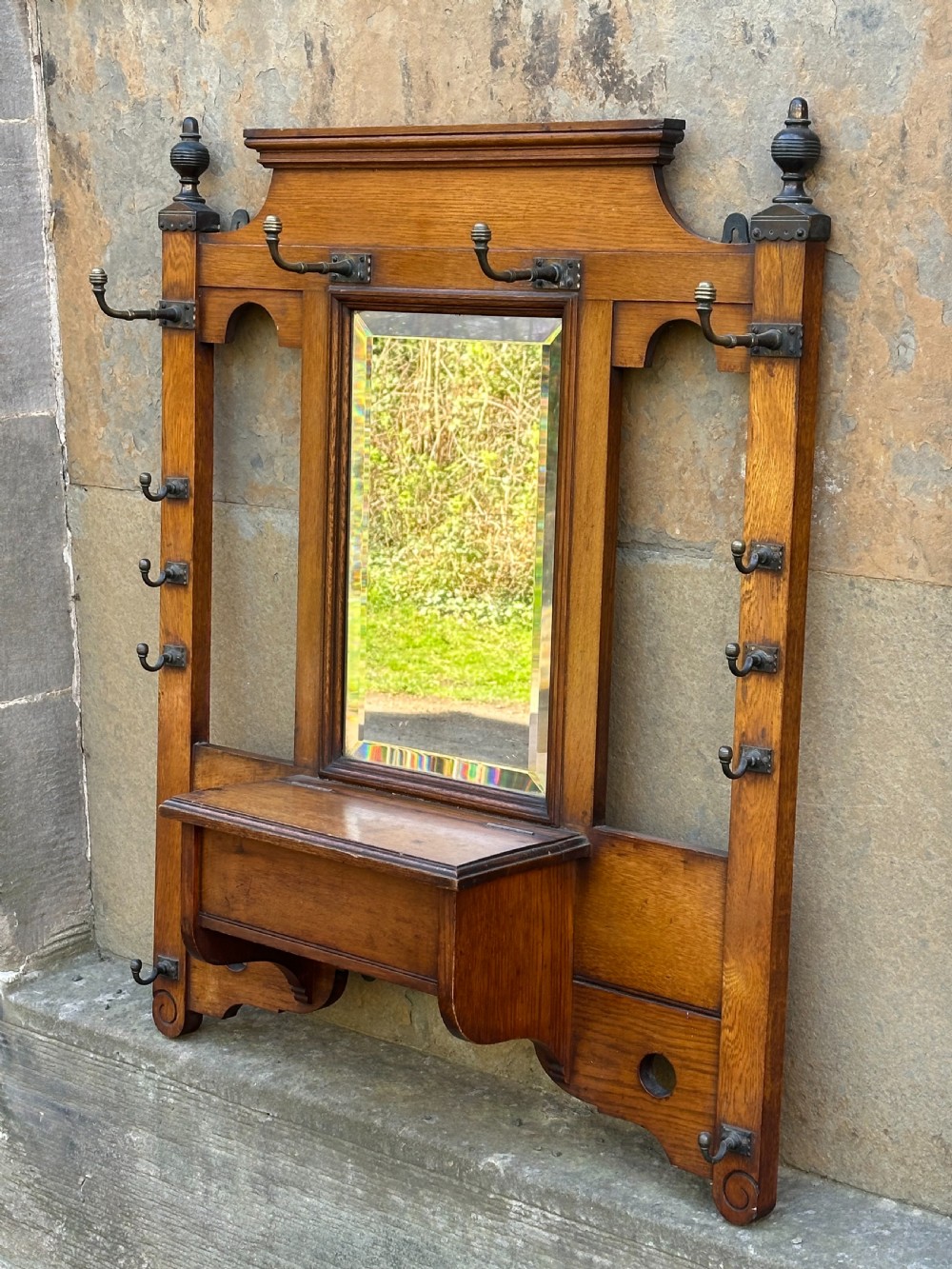 Attributed to James Shoolbred, an Aesthetic Movement oak and brass-mounted hall rack View VIII