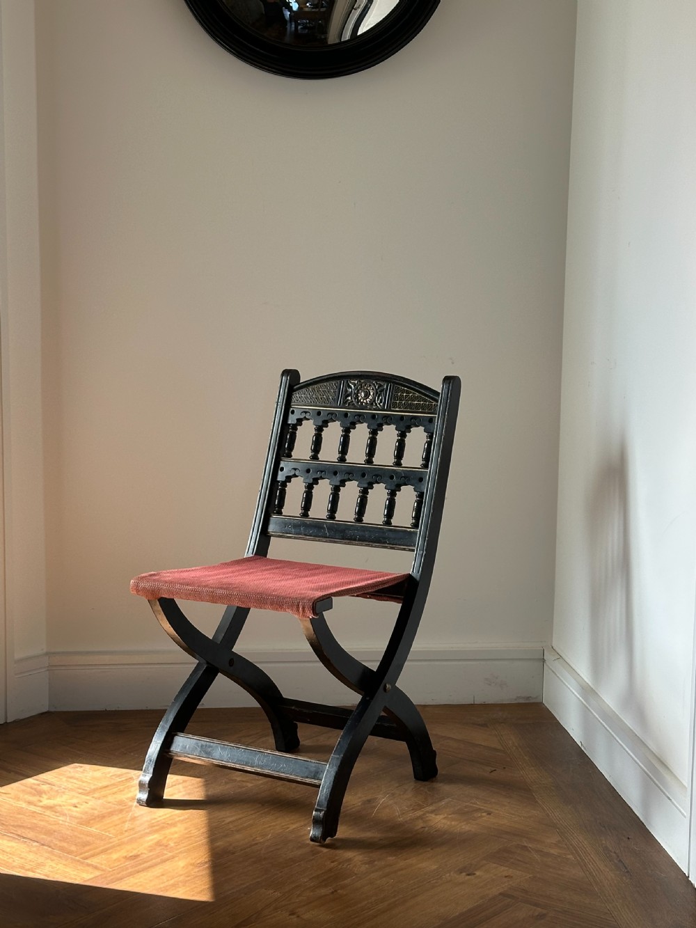 Bruce Talbert (1838-1881) A Gothic Revival ebonised mahogany folding chair, probably made by Gillows