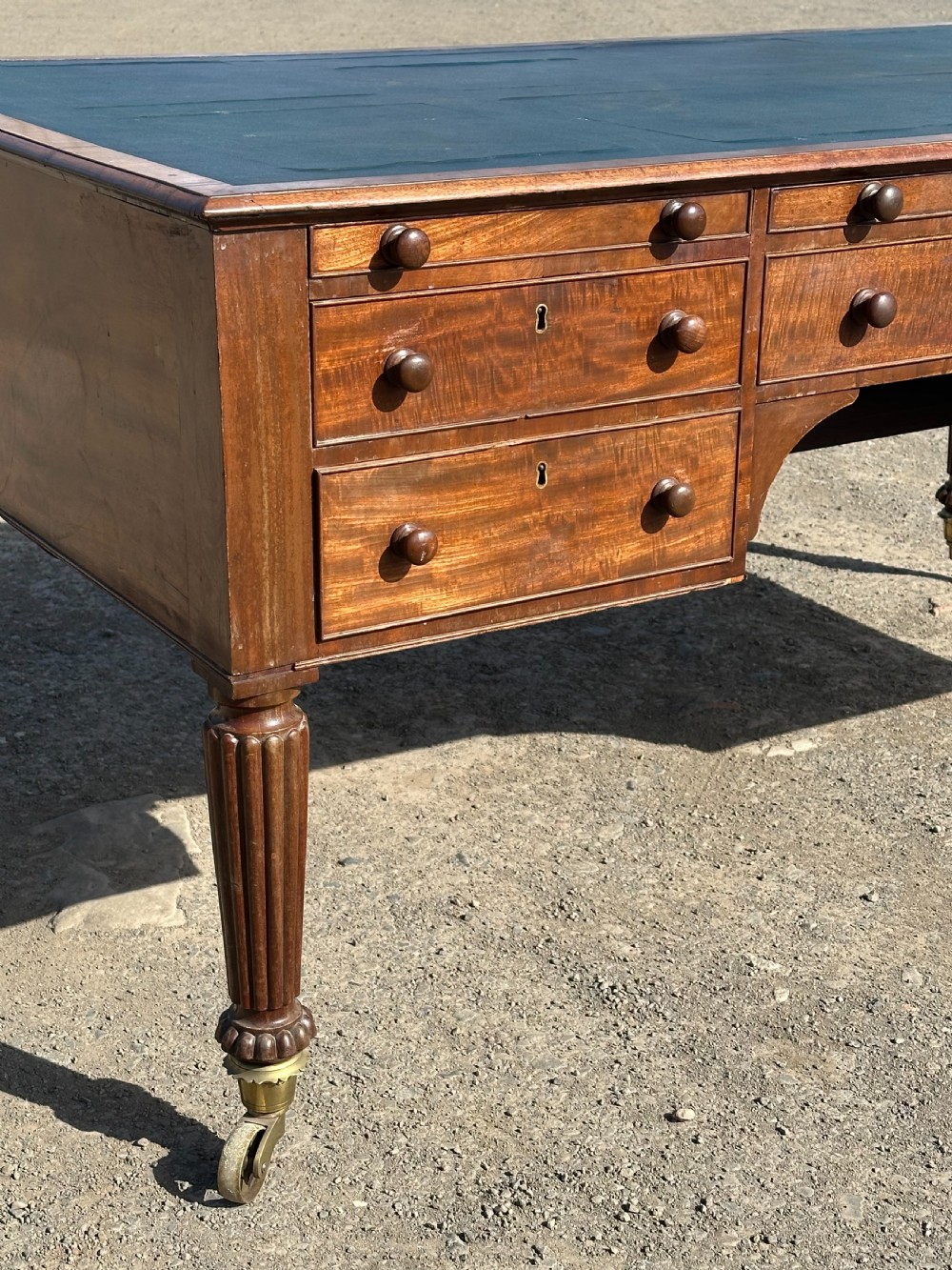 An imposing George IV mahogany partners desk in the manner of Gillows c.1820 View IV