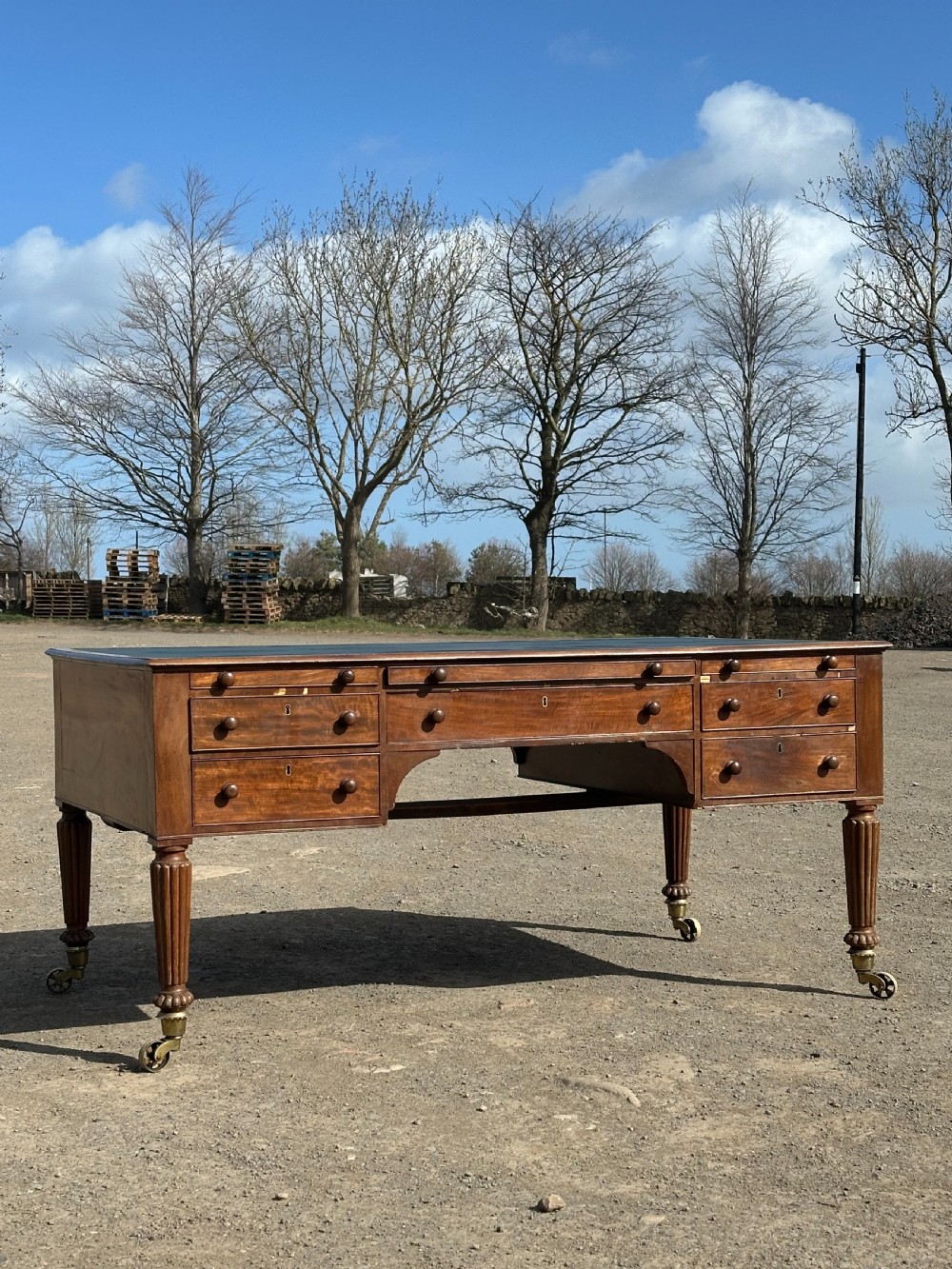 An imposing George IV mahogany partners desk in the manner of Gillows c.1820 View VI