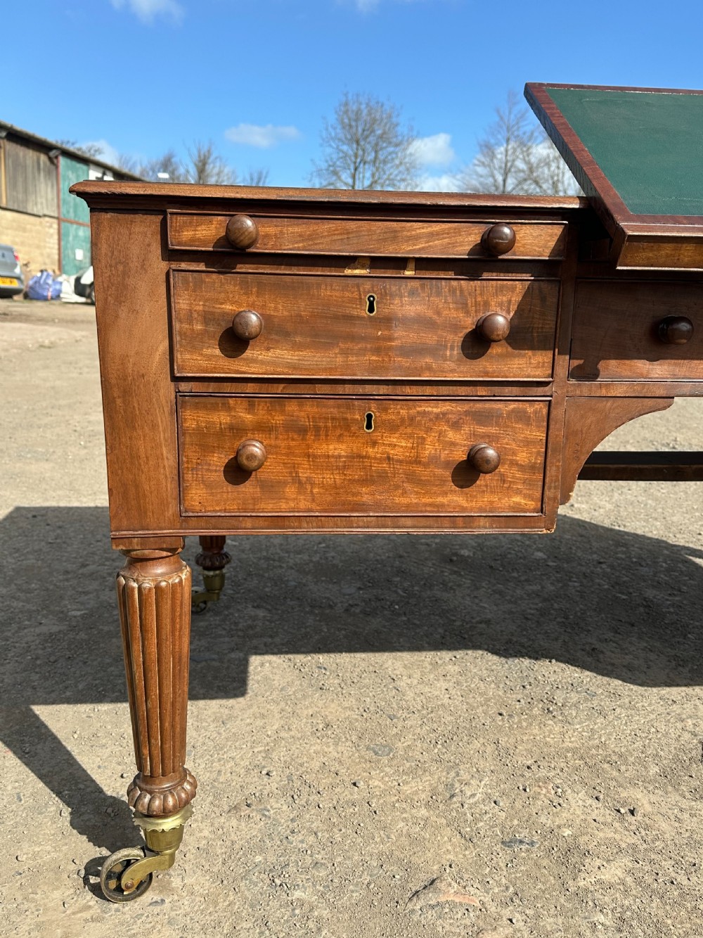 An imposing George IV mahogany partners desk in the manner of Gillows c.1820 View VIII