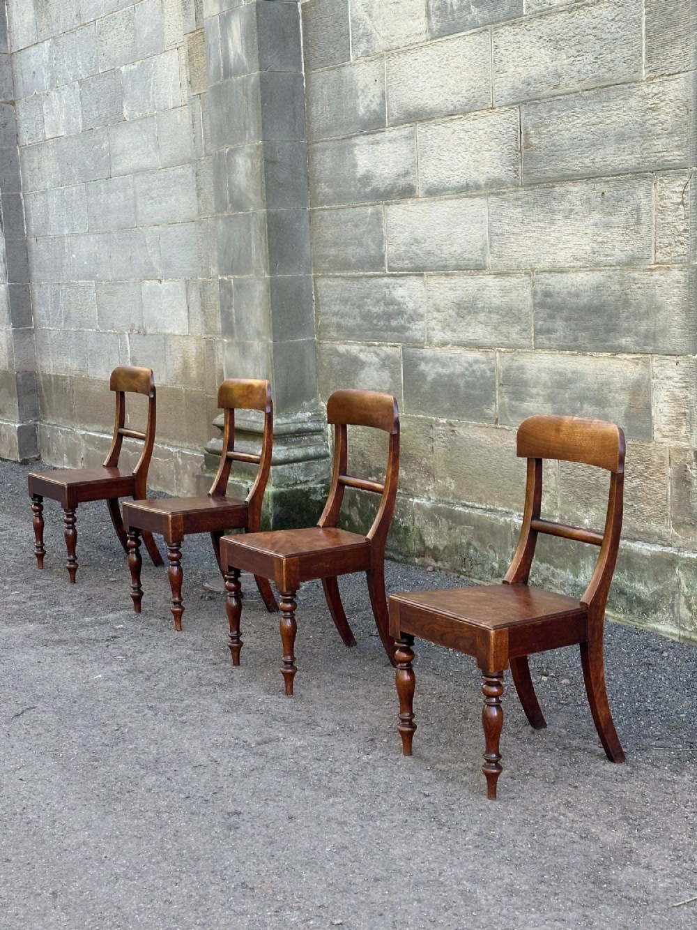 A set of four Victorian birch side chairs featuring curved top rails, turned front legs, and solid timber seats. View II