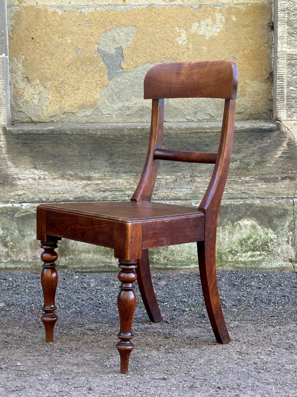 A set of four Victorian birch side chairs featuring curved top rails, turned front legs, and solid timber seats. View IV