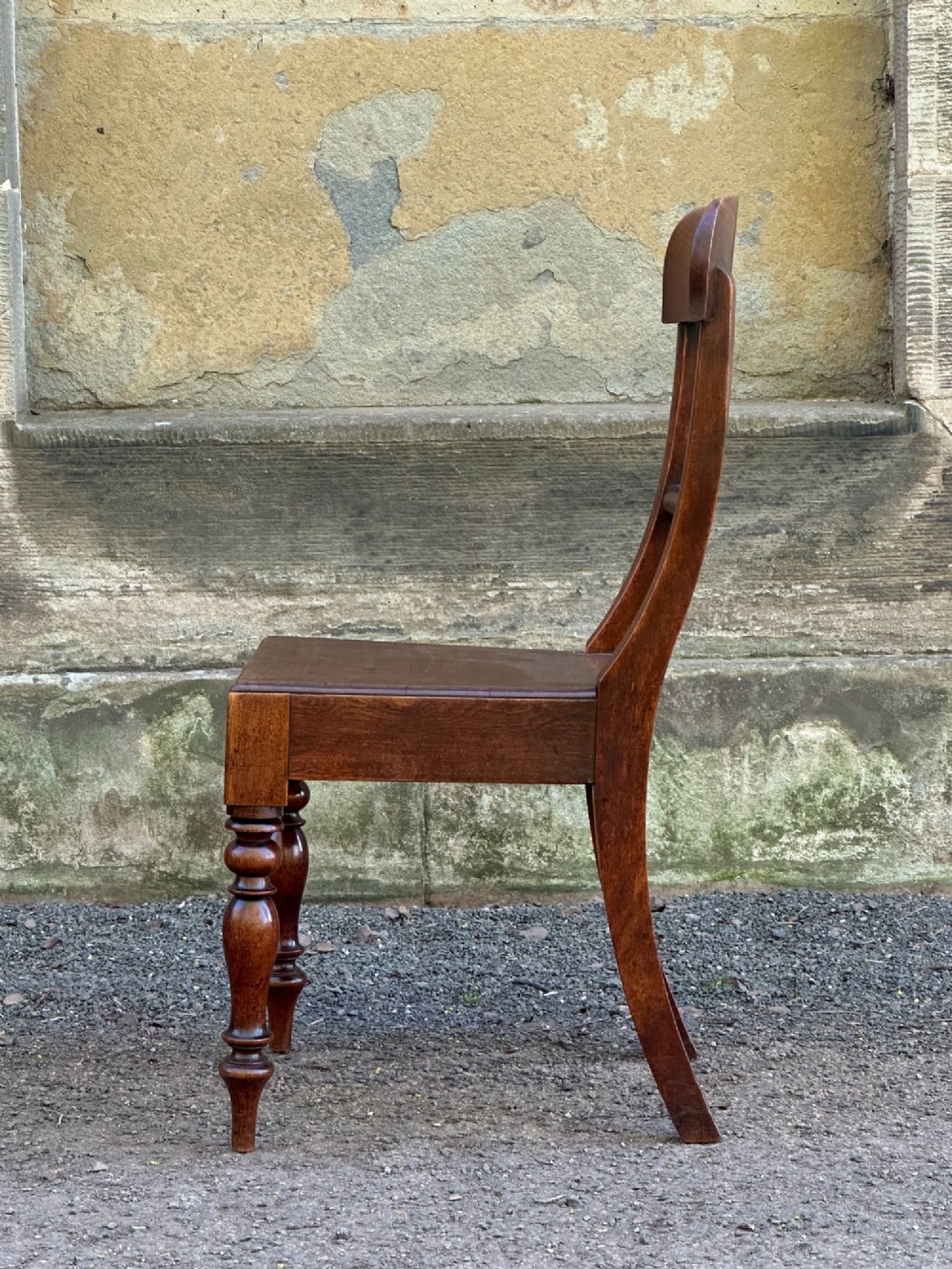 A set of four Victorian birch side chairs featuring curved top rails, turned front legs, and solid timber seats. View VIII